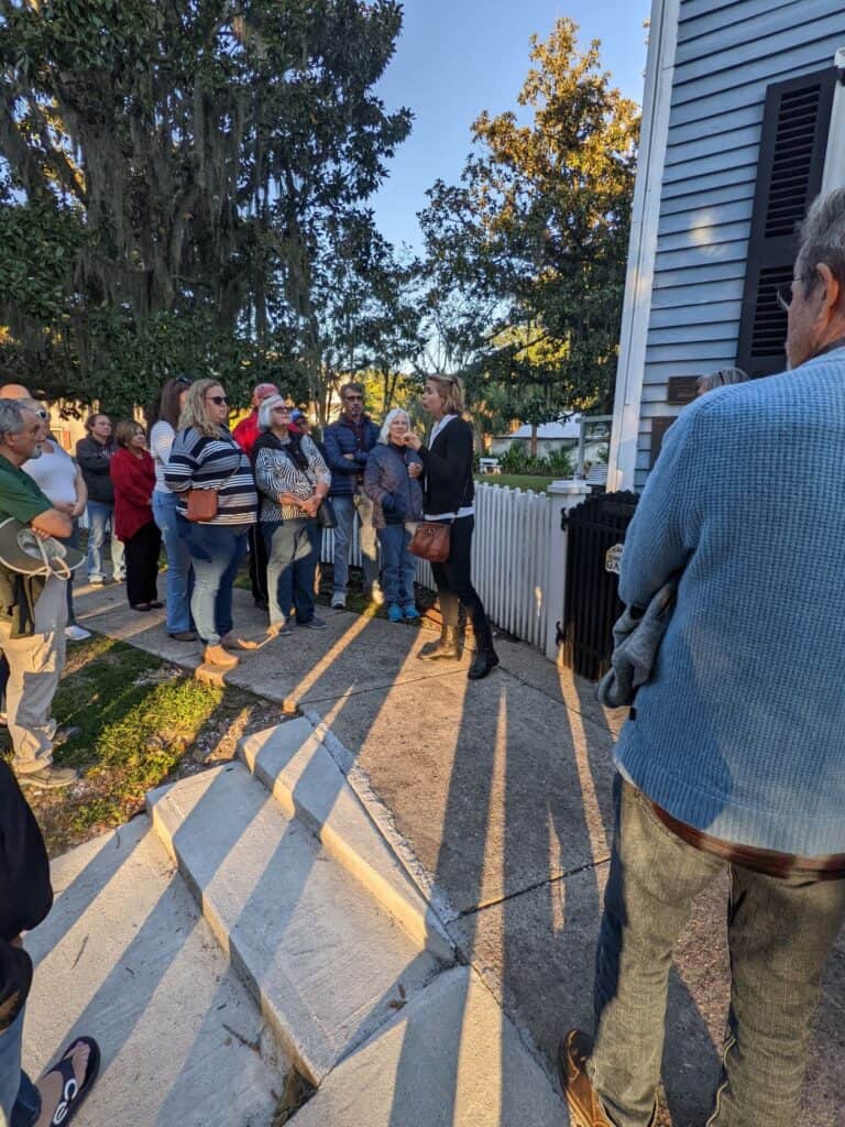 Molly's Old South Tours group discussing St. Marys' oldest house, the Archibald Clark House