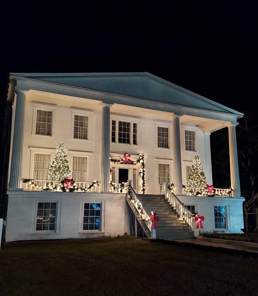 Orange Hall, a Greek Revival home from the 1830s, decorated for Christmas on a Molly's Old South Tours Churches and Chocolates tour