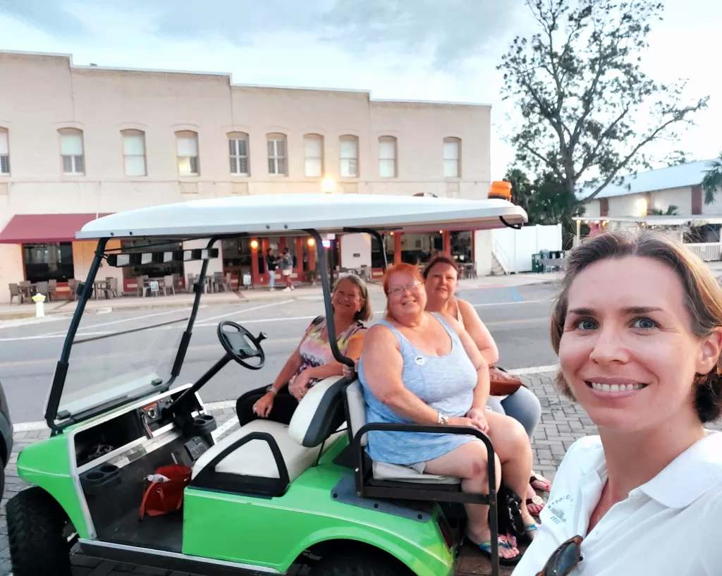 Molly's Old South golf cart tour in front of Seagles Saloon