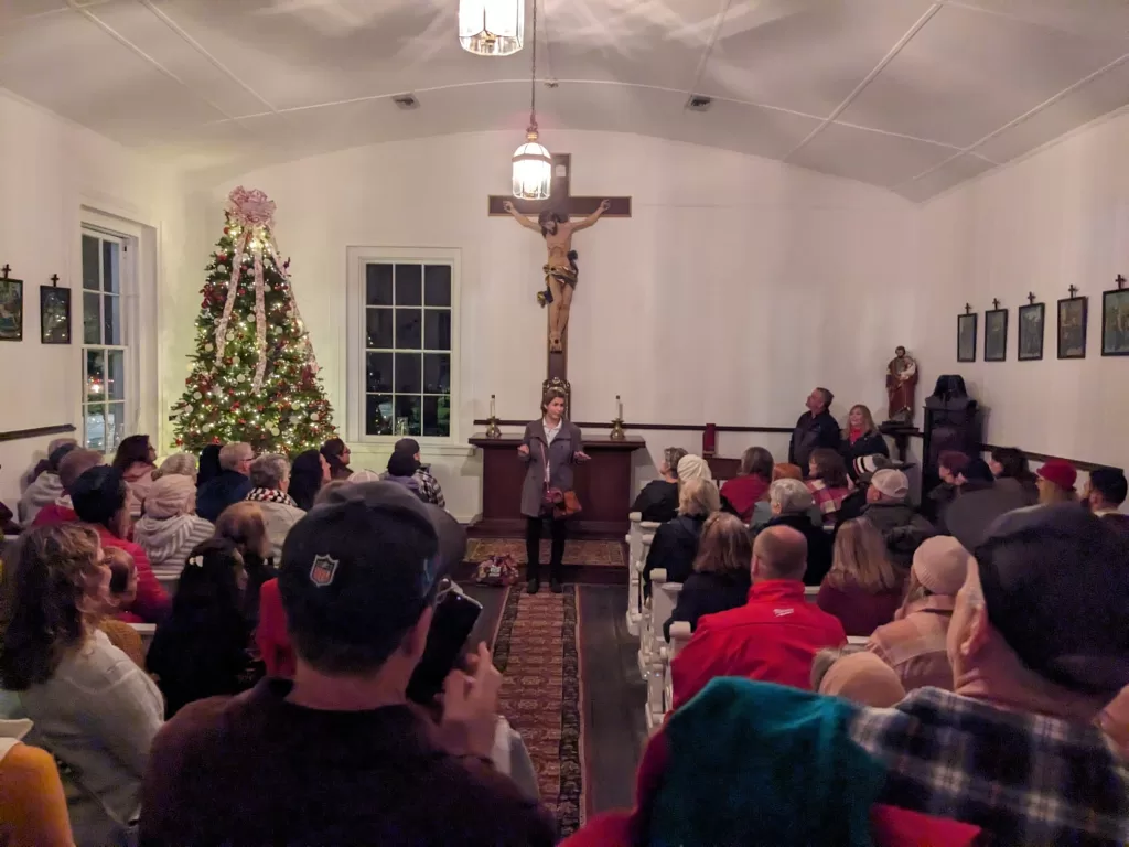 Molly's Old South Tours Churches and Chocolates group inside historic Catholic chapel